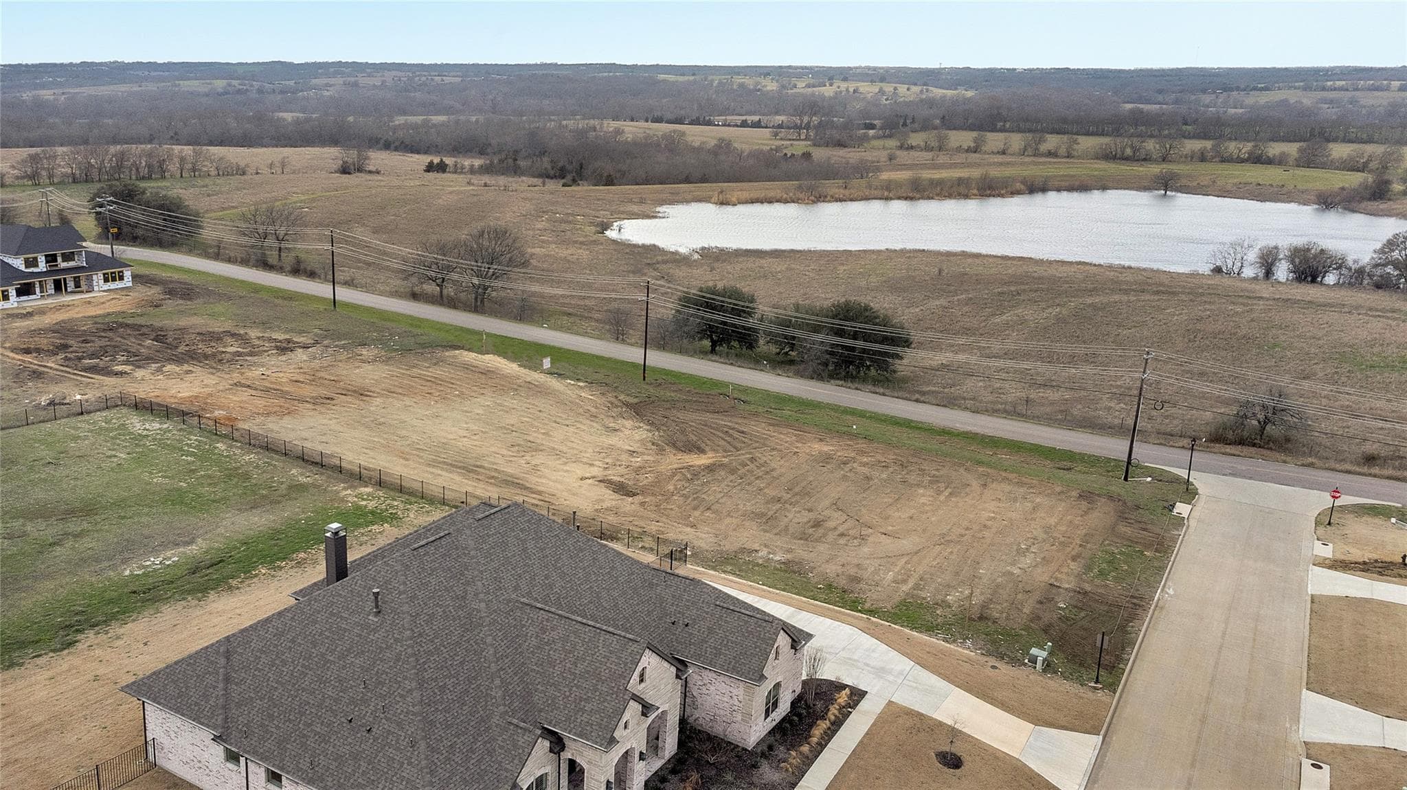 Aerial view showing lot and lake from different angle