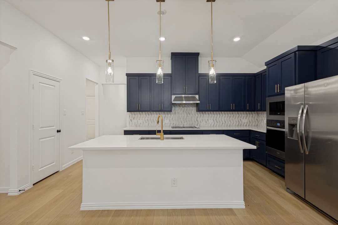 Chef's kitchen with navy cabinets